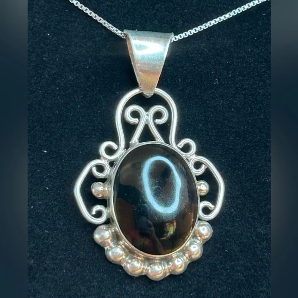 Vintage Onyx Sterling Silver Oval Filagree Pendant